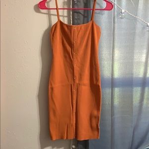 Orange skin tight button dress